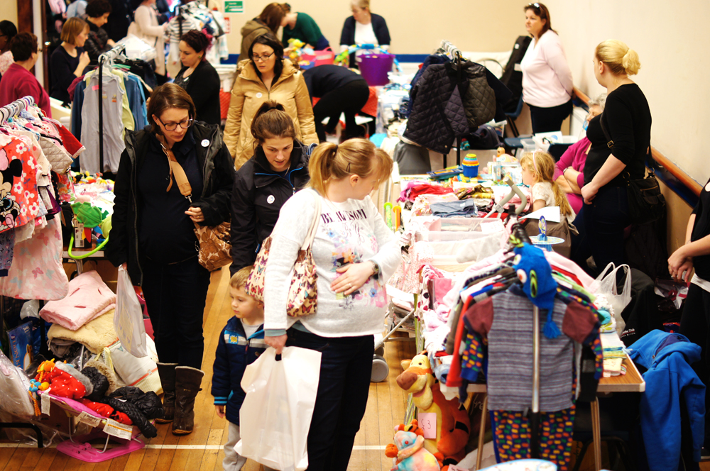 Picture: Busy shoppers at the New Haw mum2mum market nearly new sale in Surrey